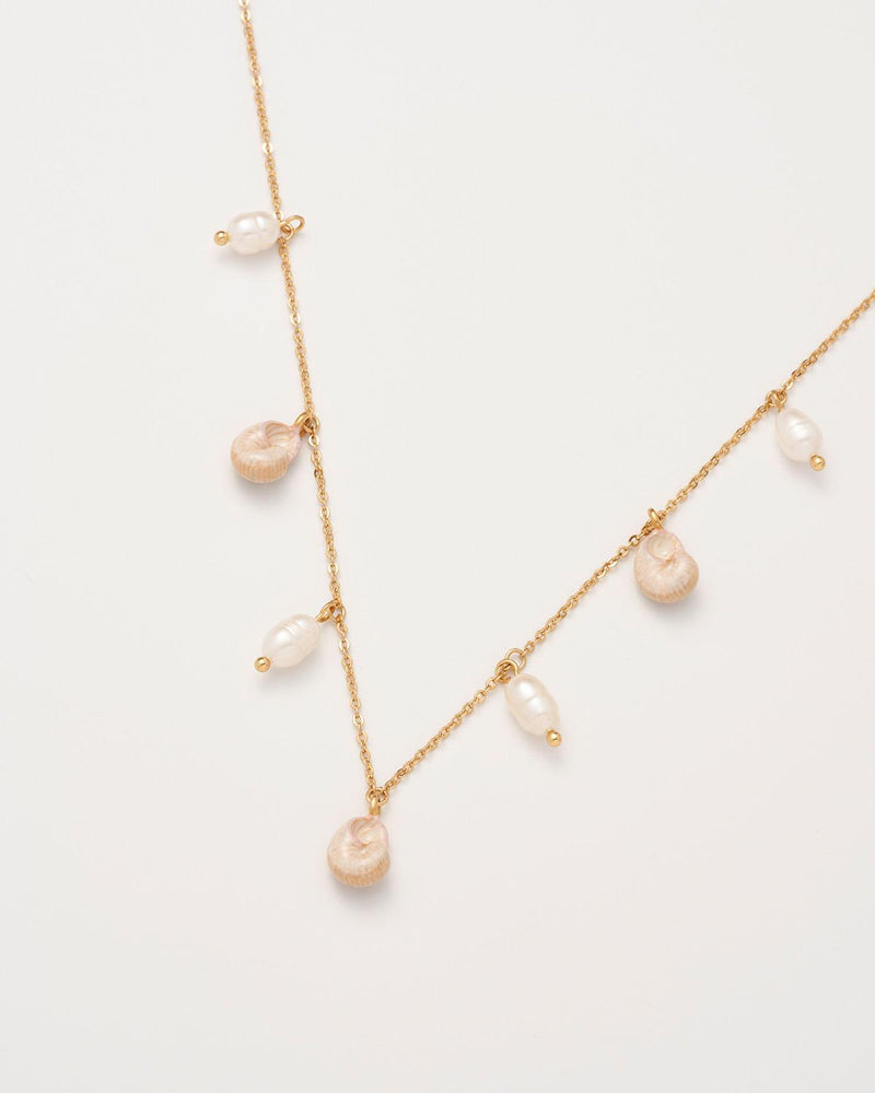 Sea Snail Charm & Pearl Worn Gold Necklace